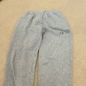 Grey brandy sweat pants. tiny tiny  hole in back